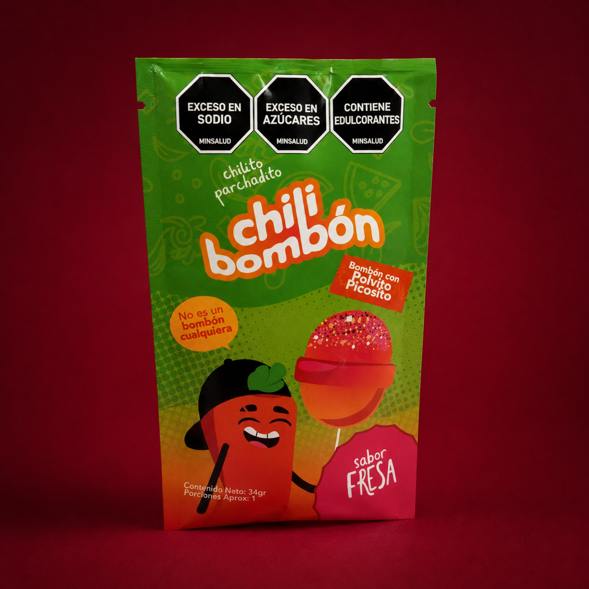 Chili bombon fresa sobre fondo vino